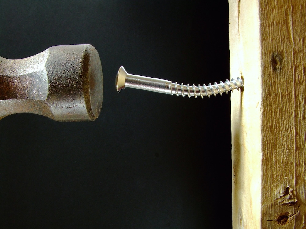 Hammering in a screw