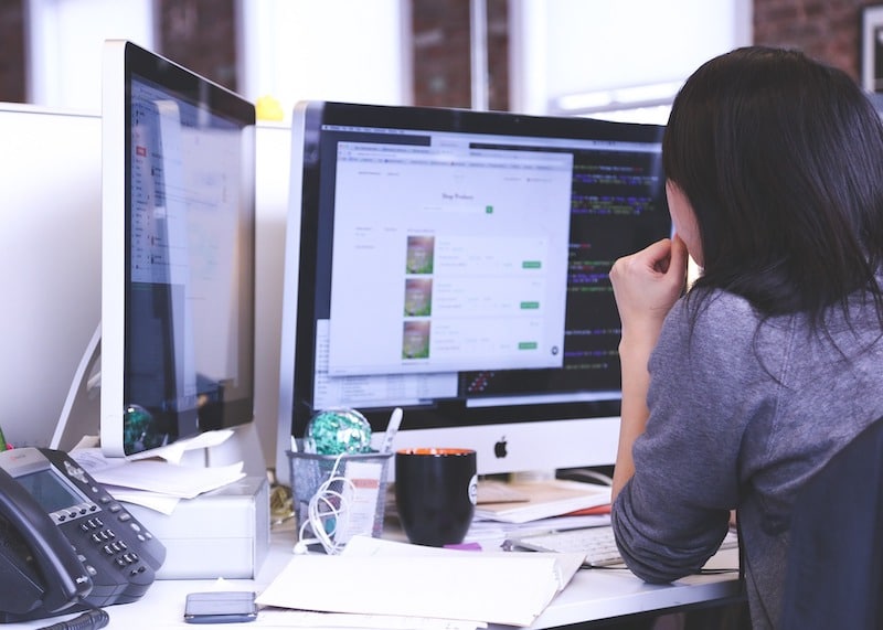 woman working at a computer screen