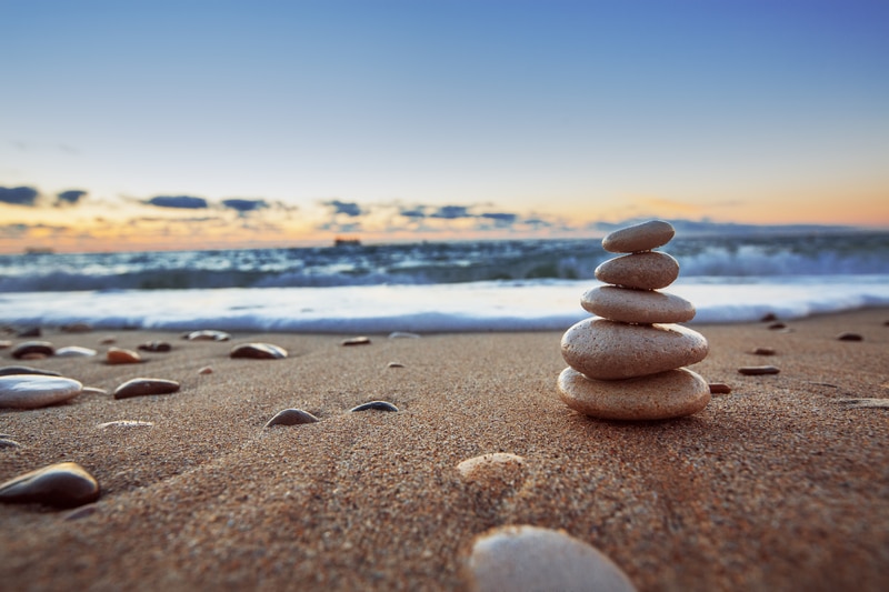 Stones stacked up on a beach