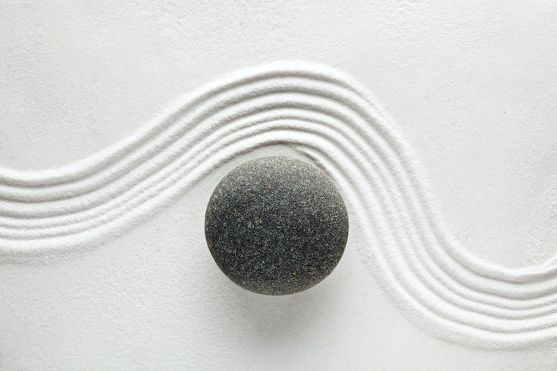 Zen stone in sand